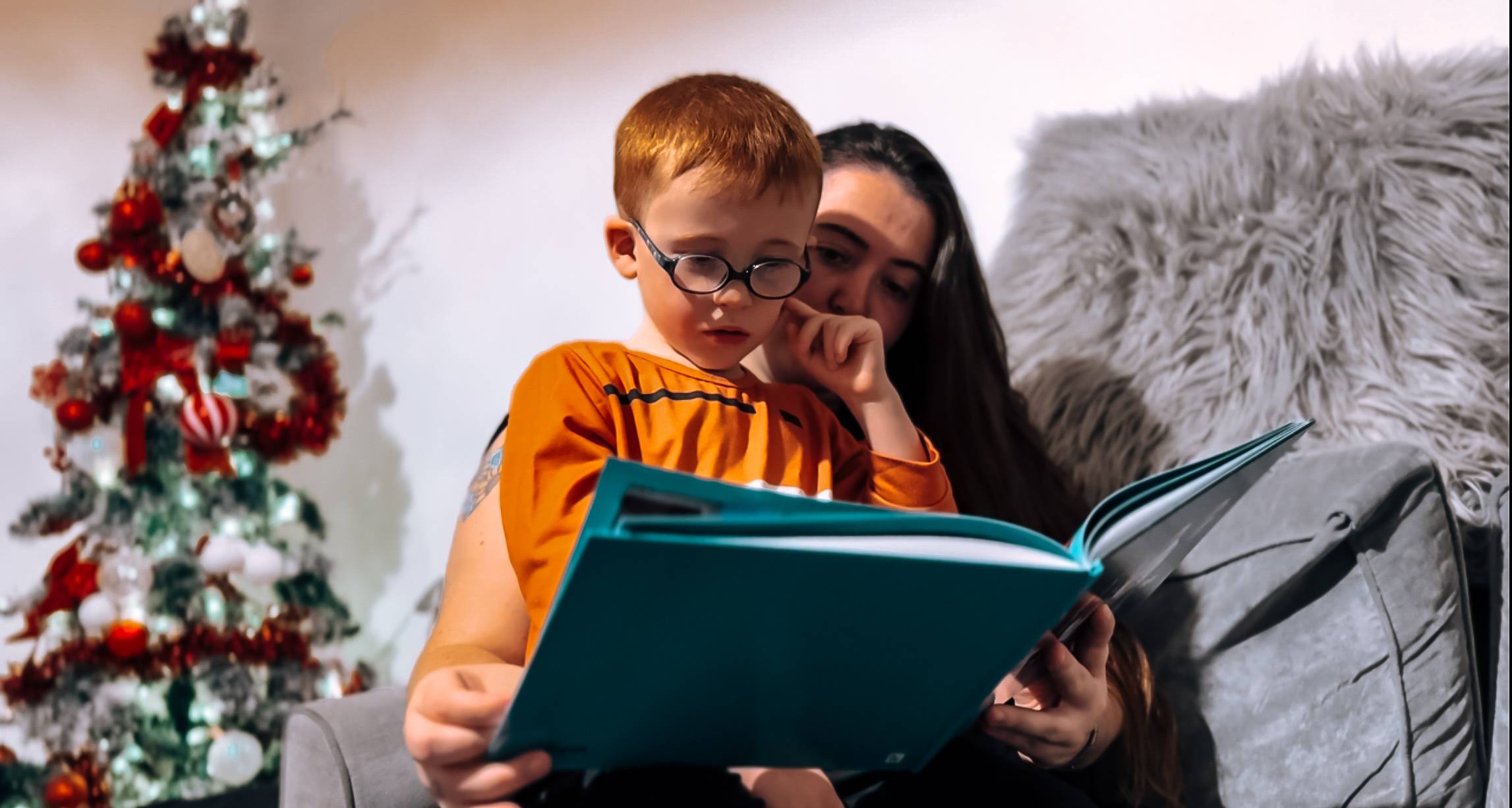 Mother and son reading a book